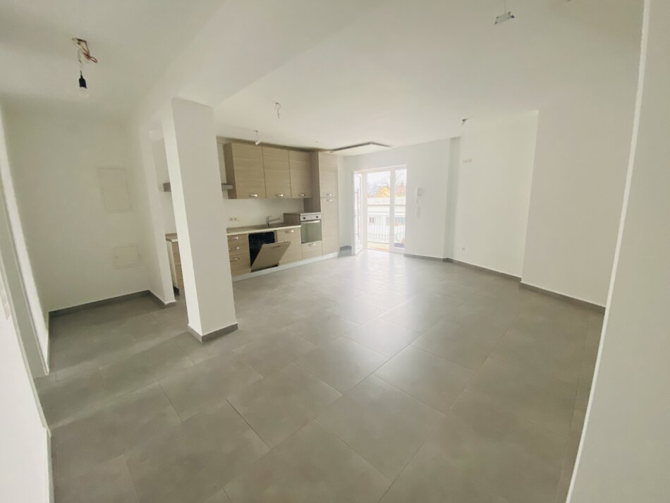 Attraktive Kapitalanlage: Vermietete 74 m² Wohnung mit Kfz-Abstellplatz in zentraler Lage