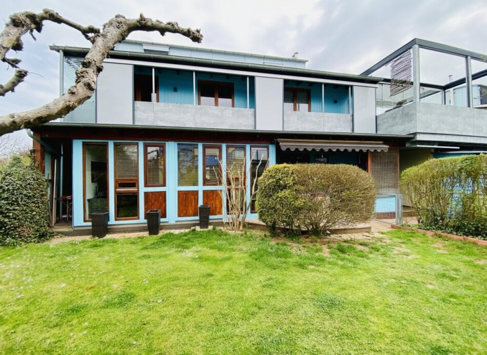 Lebensqualität pur: Gartenwohnung im EG mit 4 Zimmern, Terrasse & Garage